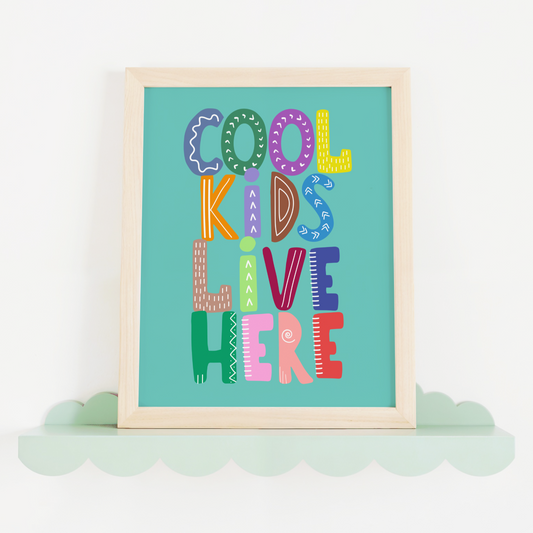 artwork with 'Cool Kids Live Here' text on a teal background